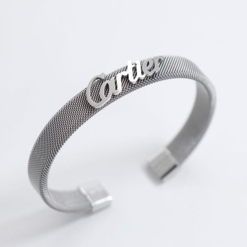 دستبند بنگل حصیری مردانه Cartier رنگ نقره ای وارداتی کد 72763
